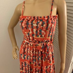 Multi-colored orange summer sun dress. Size small/medium. Never worn with tags.